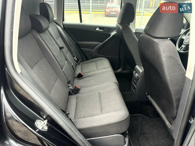 Чорний Фольксваген Тігуан, об'ємом двигуна 2 л та пробігом 165 тис. км за 9499 $, фото 16 на Automoto.ua