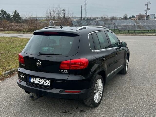Чорний Фольксваген Тігуан, об'ємом двигуна 2 л та пробігом 160 тис. км за 7800 $, фото 3 на Automoto.ua