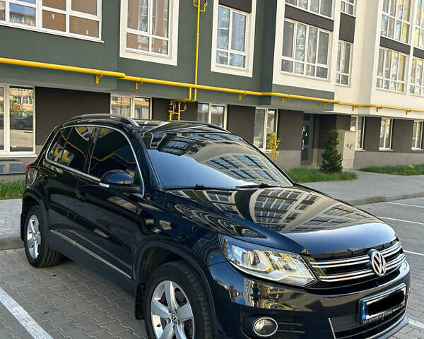 Чорний Фольксваген Тігуан, об'ємом двигуна 1.97 л та пробігом 185 тис. км за 15400 $, фото 1 на Automoto.ua