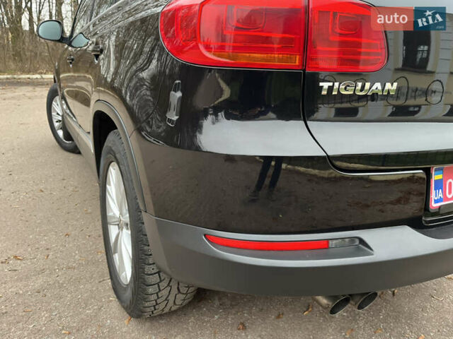 Черный Фольксваген Тигуан, объемом двигателя 1.99 л и пробегом 320 тыс. км за 14499 $, фото 64 на Automoto.ua