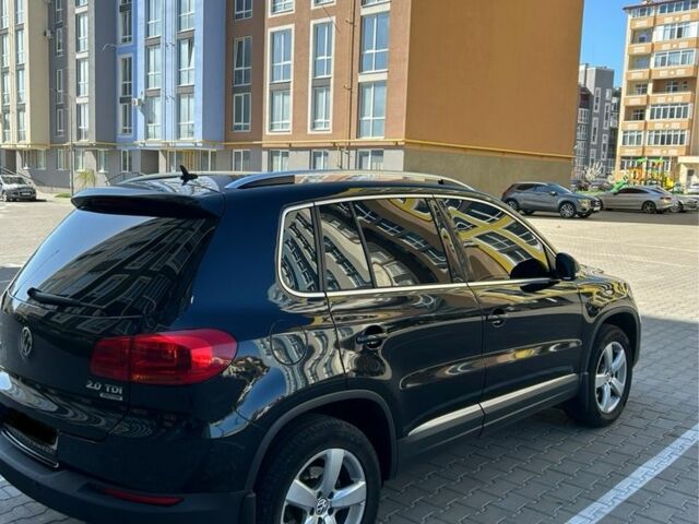 Чорний Фольксваген Тігуан, об'ємом двигуна 0 л та пробігом 195 тис. км за 16000 $, фото 4 на Automoto.ua