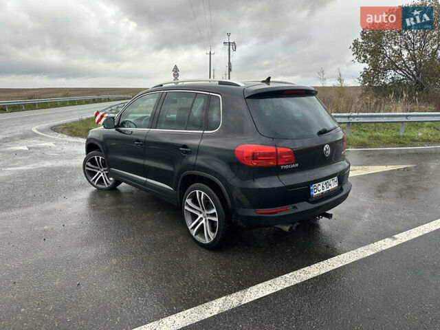 Чорний Фольксваген Тігуан, об'ємом двигуна 1.98 л та пробігом 207 тис. км за 11800 $, фото 2 на Automoto.ua