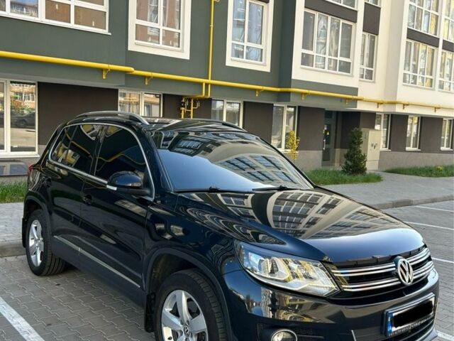 Чорний Фольксваген Тігуан, об'ємом двигуна 0 л та пробігом 195 тис. км за 16000 $, фото 6 на Automoto.ua