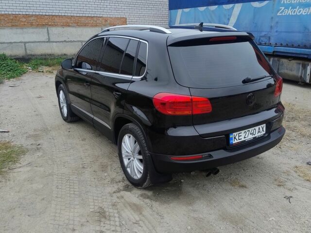 Чорний Фольксваген Тігуан, об'ємом двигуна 2 л та пробігом 189 тис. км за 11100 $, фото 2 на Automoto.ua
