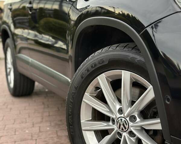 Черный Фольксваген Тигуан, объемом двигателя 1.99 л и пробегом 225 тыс. км за 14950 $, фото 23 на Automoto.ua