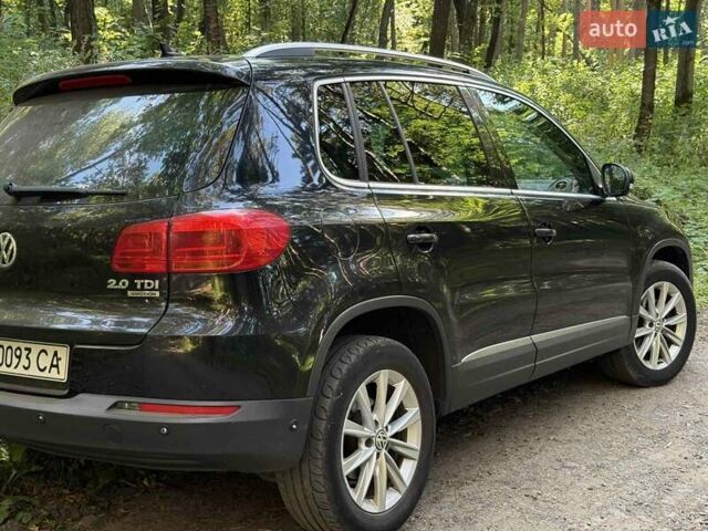 Черный Фольксваген Тигуан, объемом двигателя 1.97 л и пробегом 270 тыс. км за 11500 $, фото 1 на Automoto.ua