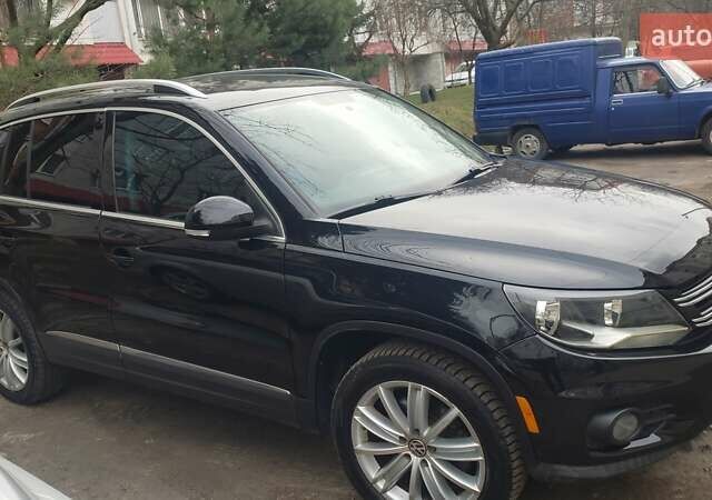 Черный Фольксваген Тигуан, объемом двигателя 2 л и пробегом 267 тыс. км за 13000 $, фото 7 на Automoto.ua