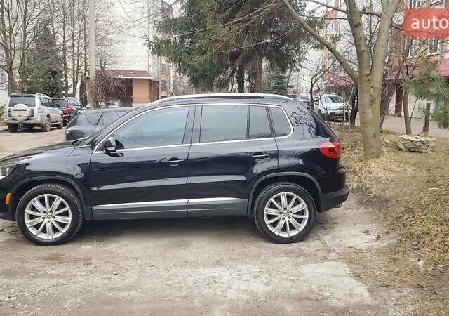 Черный Фольксваген Тигуан, объемом двигателя 2 л и пробегом 267 тыс. км за 13000 $, фото 4 на Automoto.ua