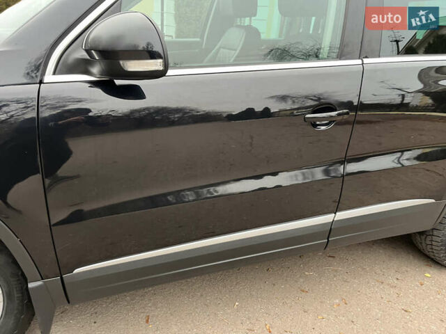 Черный Фольксваген Тигуан, объемом двигателя 1.99 л и пробегом 320 тыс. км за 14499 $, фото 61 на Automoto.ua