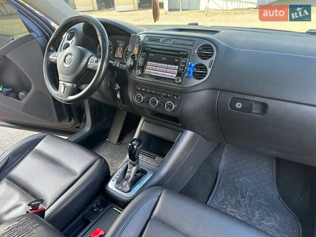 Чорний Фольксваген Тігуан, об'ємом двигуна 2 л та пробігом 189 тис. км за 10300 $, фото 23 на Automoto.ua