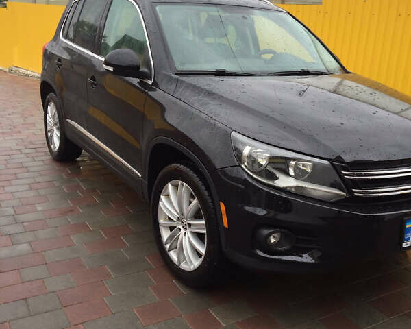 Черный Фольксваген Тигуан, объемом двигателя 2 л и пробегом 130 тыс. км за 13300 $, фото 2 на Automoto.ua