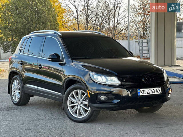 Чорний Фольксваген Тігуан, об'ємом двигуна 2 л та пробігом 189 тис. км за 10300 $, фото 2 на Automoto.ua