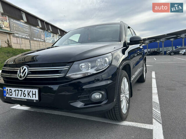 Черный Фольксваген Тигуан, объемом двигателя 2 л и пробегом 222 тыс. км за 12200 $, фото 1 на Automoto.ua