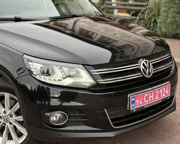 Черный Фольксваген Тигуан, объемом двигателя 1.99 л и пробегом 225 тыс. км за 14950 $, фото 22 на Automoto.ua