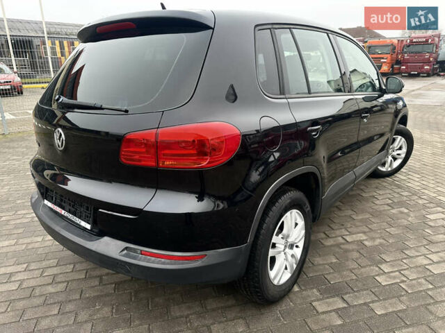 Чорний Фольксваген Тігуан, об'ємом двигуна 2 л та пробігом 165 тис. км за 9499 $, фото 2 на Automoto.ua