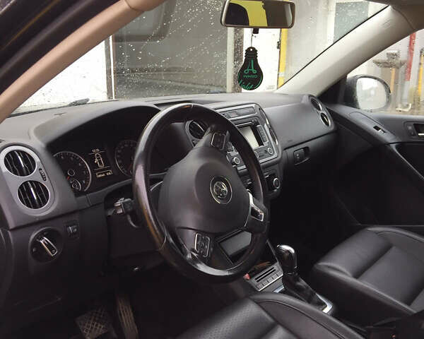 Черный Фольксваген Тигуан, объемом двигателя 2 л и пробегом 130 тыс. км за 13300 $, фото 8 на Automoto.ua