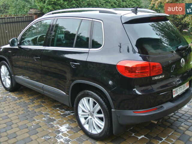 Чорний Фольксваген Тігуан, об'ємом двигуна 2 л та пробігом 168 тис. км за 15550 $, фото 5 на Automoto.ua