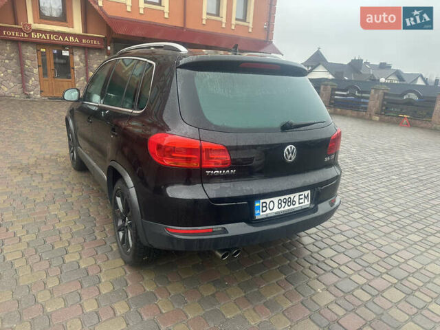 Черный Фольксваген Тигуан, объемом двигателя 1.98 л и пробегом 140 тыс. км за 11333 $, фото 2 на Automoto.ua