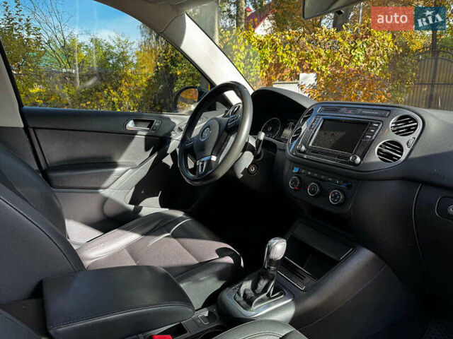 Черный Фольксваген Тигуан, объемом двигателя 2 л и пробегом 166 тыс. км за 12290 $, фото 28 на Automoto.ua