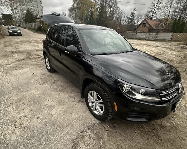 Черный Фольксваген Тигуан, объемом двигателя 1.98 л и пробегом 210 тыс. км за 10500 $, фото 1 на Automoto.ua