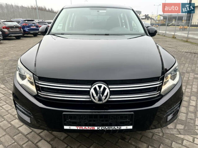 Чорний Фольксваген Тігуан, об'ємом двигуна 2 л та пробігом 165 тис. км за 9499 $, фото 1 на Automoto.ua