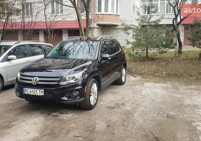 Черный Фольксваген Тигуан, объемом двигателя 2 л и пробегом 267 тыс. км за 13000 $, фото 2 на Automoto.ua