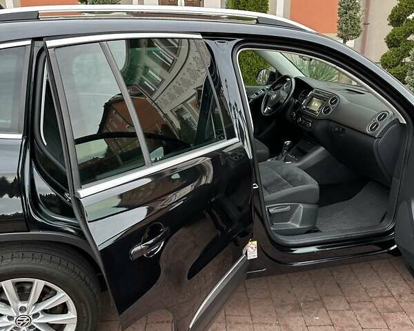 Черный Фольксваген Тигуан, объемом двигателя 1.99 л и пробегом 225 тыс. км за 14950 $, фото 92 на Automoto.ua