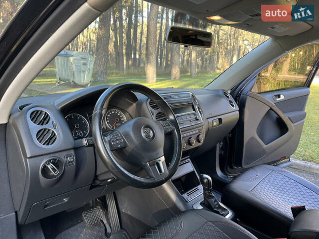 Черный Фольксваген Тигуан, объемом двигателя 2 л и пробегом 185 тыс. км за 11500 $, фото 25 на Automoto.ua