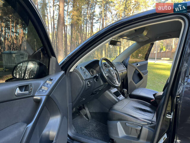 Черный Фольксваген Тигуан, объемом двигателя 2 л и пробегом 185 тыс. км за 11500 $, фото 23 на Automoto.ua