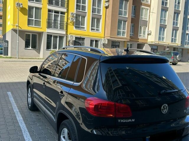 Чорний Фольксваген Тігуан, об'ємом двигуна 0 л та пробігом 195 тис. км за 16000 $, фото 2 на Automoto.ua