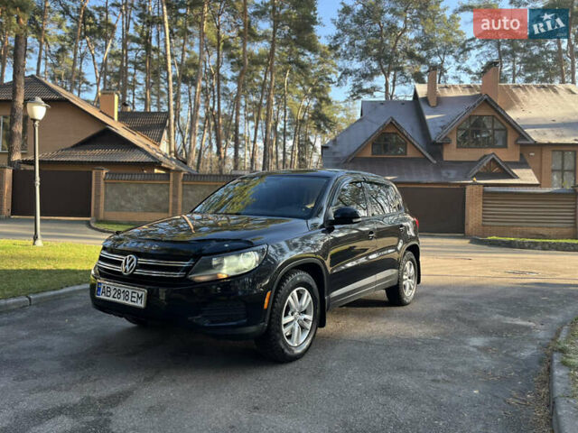 Черный Фольксваген Тигуан, объемом двигателя 2 л и пробегом 185 тыс. км за 11500 $, фото 1 на Automoto.ua