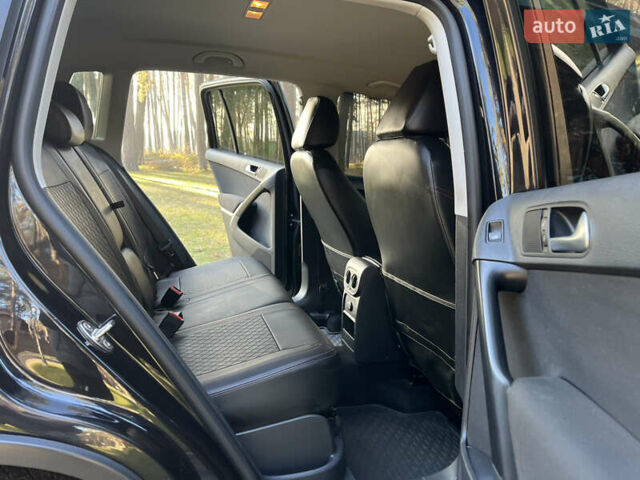 Черный Фольксваген Тигуан, объемом двигателя 2 л и пробегом 185 тыс. км за 11500 $, фото 29 на Automoto.ua