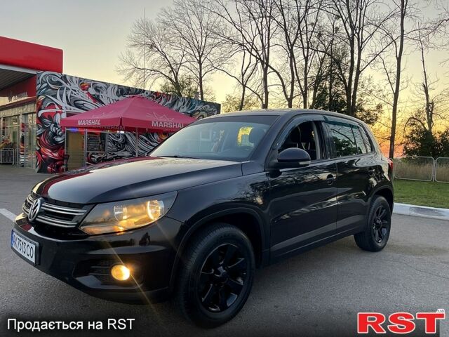 Черный Фольксваген Тигуан, объемом двигателя 2 л и пробегом 181 тыс. км за 9200 $, фото 2 на Automoto.ua