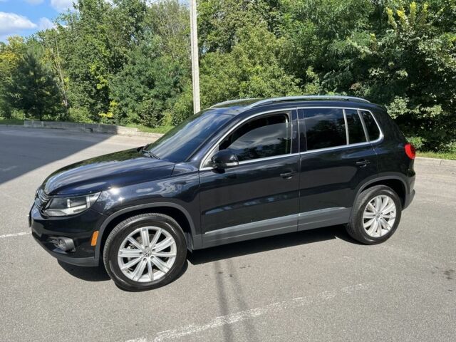 Черный Фольксваген Тигуан, объемом двигателя 2 л и пробегом 176 тыс. км за 12499 $, фото 1 на Automoto.ua