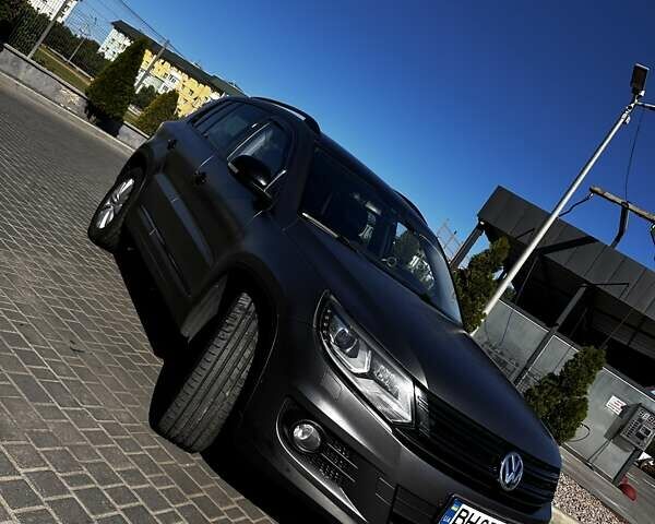 Черный Фольксваген Тигуан, объемом двигателя 1.97 л и пробегом 215 тыс. км за 15000 $, фото 1 на Automoto.ua