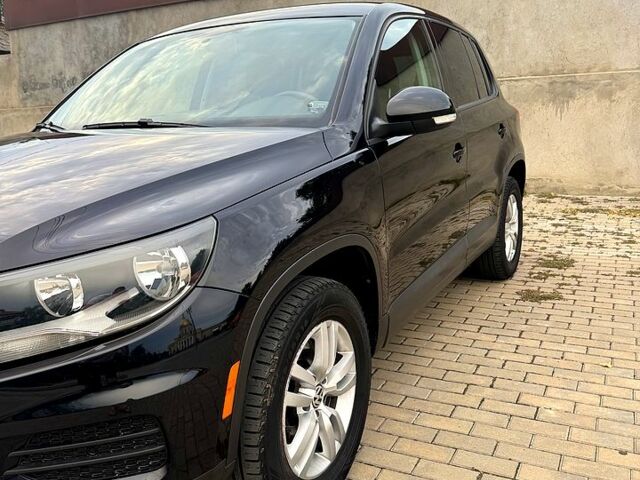Чорний Фольксваген Тігуан, об'ємом двигуна 2 л та пробігом 229 тис. км за 10500 $, фото 1 на Automoto.ua