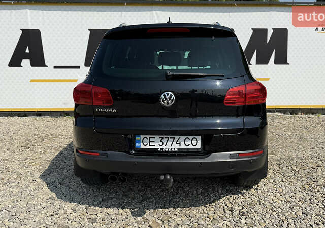 Черный Фольксваген Тигуан, объемом двигателя 1.97 л и пробегом 204 тыс. км за 14900 $, фото 1 на Automoto.ua