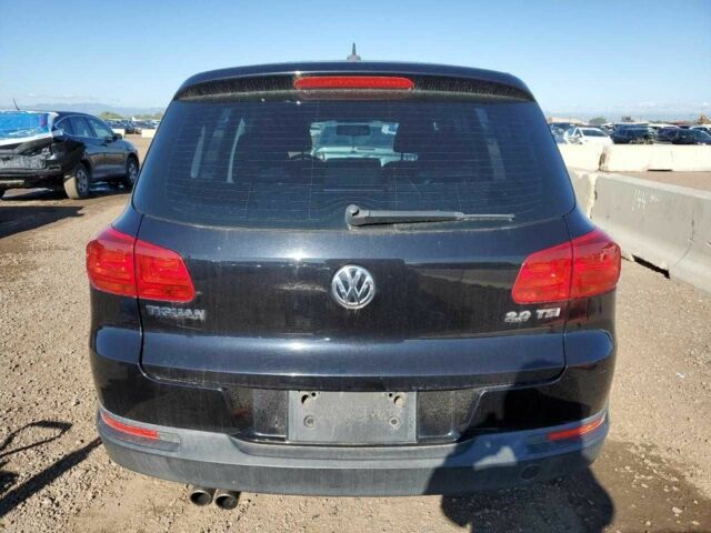 Черный Фольксваген Тигуан, объемом двигателя 2 л и пробегом 118 тыс. км за 1200 $, фото 5 на Automoto.ua