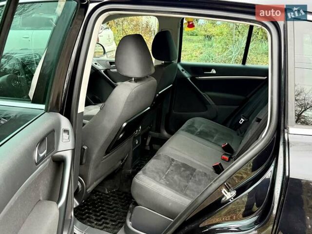 Черный Фольксваген Тигуан, объемом двигателя 1.97 л и пробегом 310 тыс. км за 14500 $, фото 23 на Automoto.ua