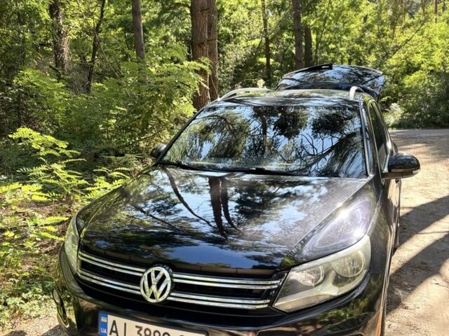 Черный Фольксваген Тигуан, объемом двигателя 2 л и пробегом 230 тыс. км за 13500 $, фото 1 на Automoto.ua