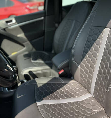 Черный Фольксваген Тигуан, объемом двигателя 1.97 л и пробегом 204 тыс. км за 14900 $, фото 3 на Automoto.ua