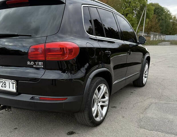 Чорний Фольксваген Тігуан, об'ємом двигуна 2 л та пробігом 200 тис. км за 12900 $, фото 3 на Automoto.ua
