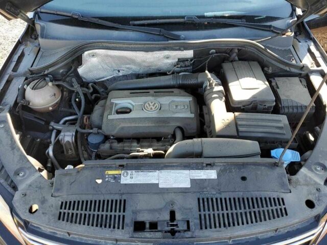 Черный Фольксваген Тигуан, объемом двигателя 2 л и пробегом 118 тыс. км за 1200 $, фото 11 на Automoto.ua