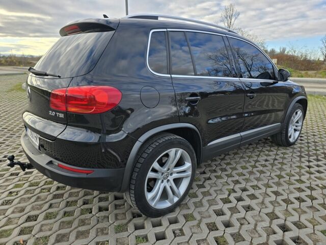 Чорний Фольксваген Тігуан, об'ємом двигуна 2 л та пробігом 194 тис. км за 12499 $, фото 6 на Automoto.ua