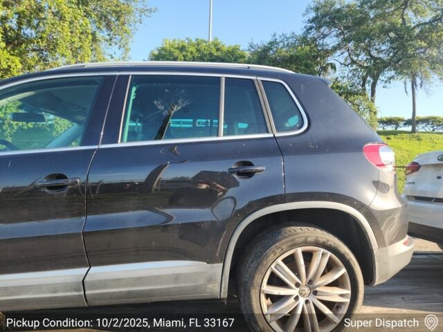 Чорний Фольксваген Тігуан, об'ємом двигуна 2 л та пробігом 156 тис. км за 7000 $, фото 5 на Automoto.ua