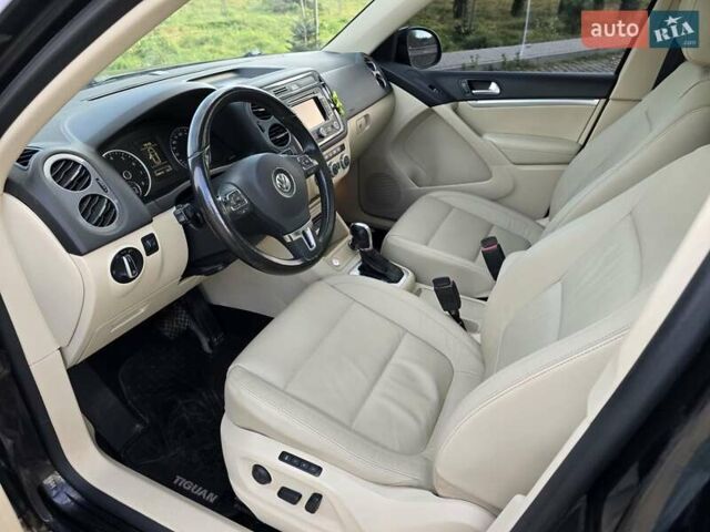 Чорний Фольксваген Тігуан, об'ємом двигуна 1.98 л та пробігом 349 тис. км за 12499 $, фото 1 на Automoto.ua