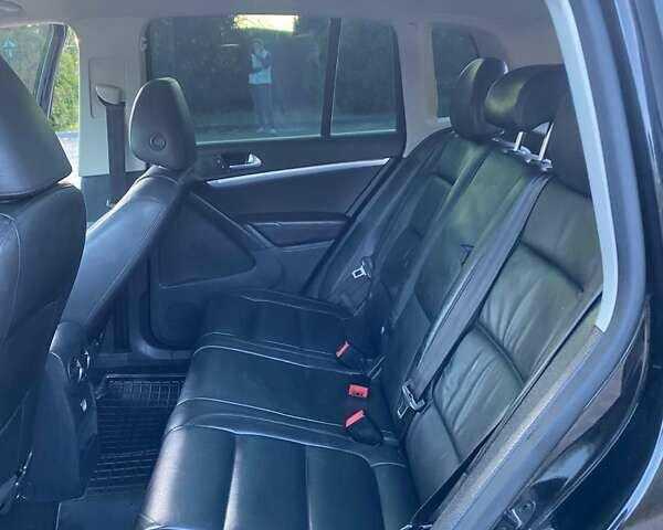 Чорний Фольксваген Тігуан, об'ємом двигуна 1.99 л та пробігом 180 тис. км за 11300 $, фото 59 на Automoto.ua