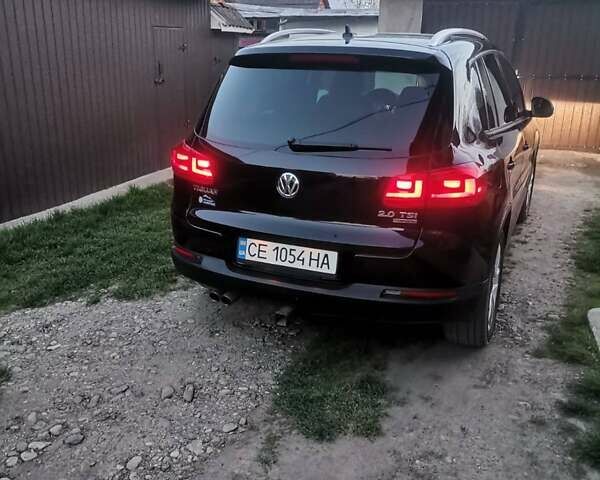 Черный Фольксваген Тигуан, объемом двигателя 1.98 л и пробегом 180 тыс. км за 11850 $, фото 1 на Automoto.ua