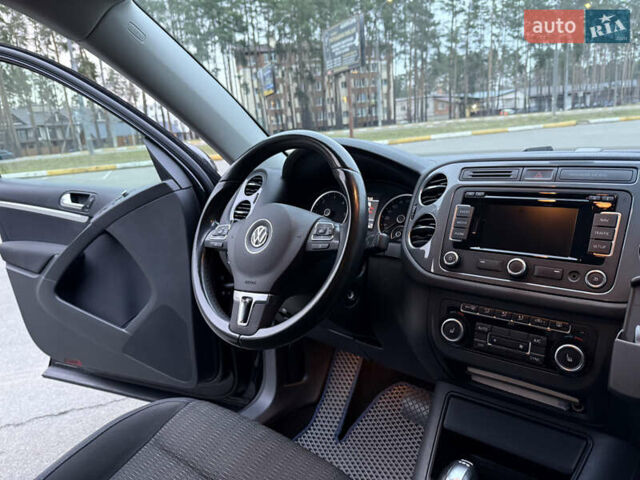 Чорний Фольксваген Тігуан, об'ємом двигуна 1.97 л та пробігом 266 тис. км за 15000 $, фото 14 на Automoto.ua