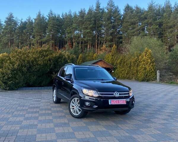 Чорний Фольксваген Тігуан, об'ємом двигуна 1.99 л та пробігом 180 тис. км за 11300 $, фото 2 на Automoto.ua